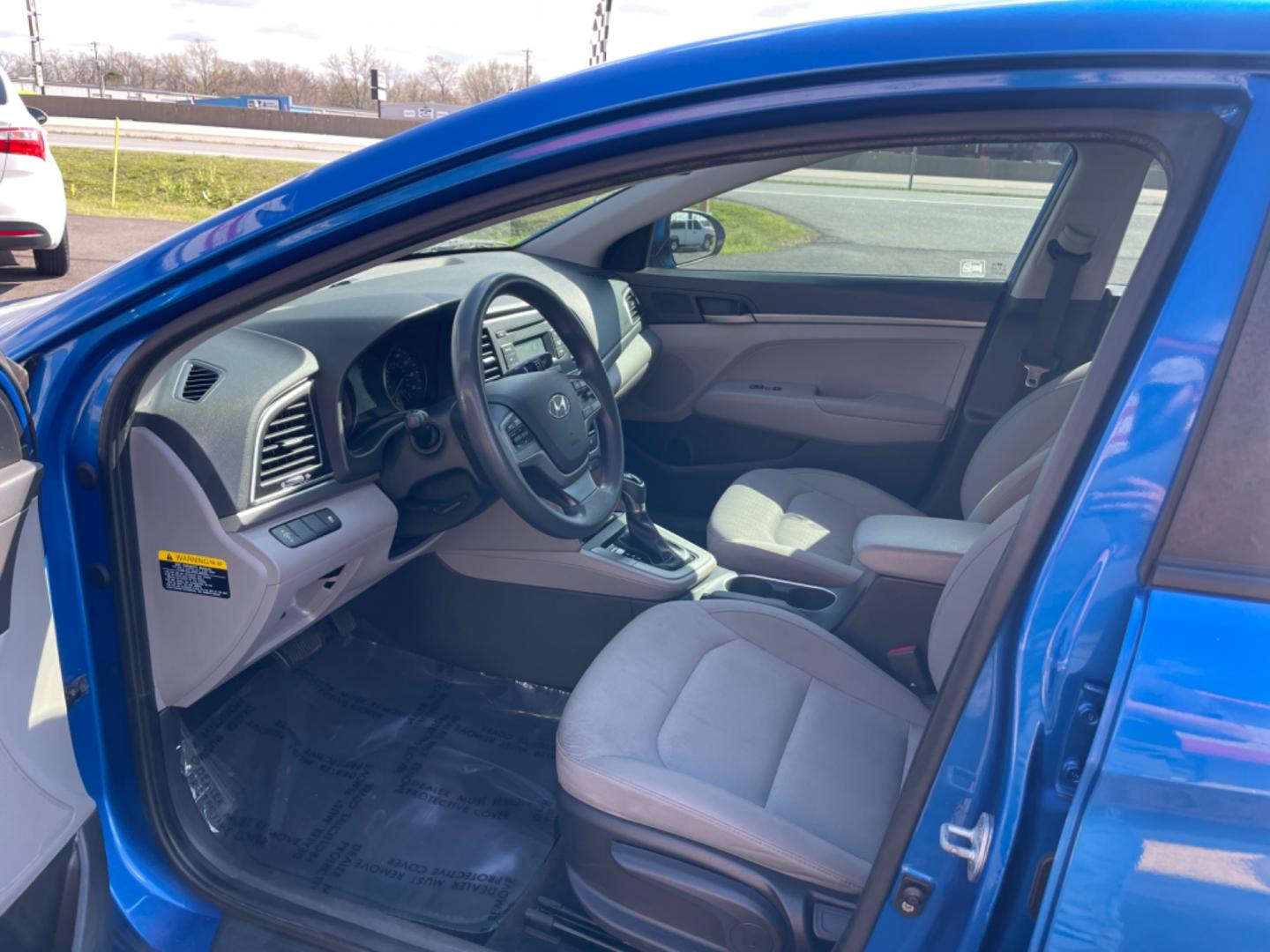 2017 Blue Hyundai Elantra (KMHD74LF7HU) with an 4-Cyl, 2.0 Liter engine, Auto, 6-Spd Shiftronic transmission, located at 8008 Warden Rd, Sherwood, AR, 72120, (501) 801-6100, 34.830078, -92.186684 - Photo#12